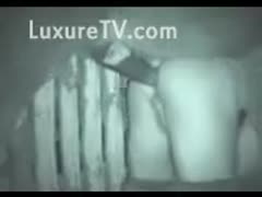 A classic beastiality movie scene with a guy being drilled by a horse captured in night vision